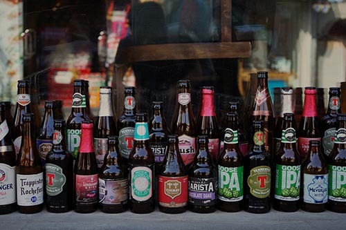 brown colored glass beer bottles