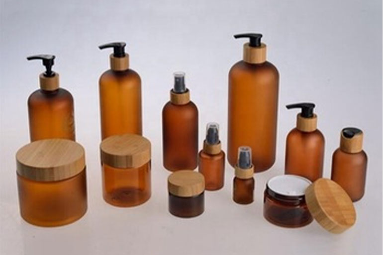 different styles of amber glass bottle and jars for cosmetics