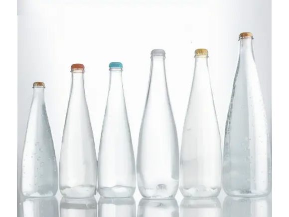 different sizes of sparkling water glass bottles