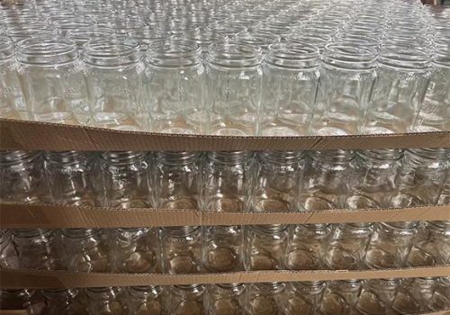 glass pickle jars well arranged in the pallet board