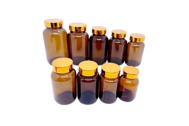 glass pill bottle with different sizes
