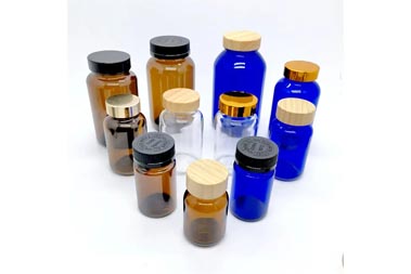 clear, amber and blue glass prescription bottle