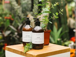 glass soap dispenser with label