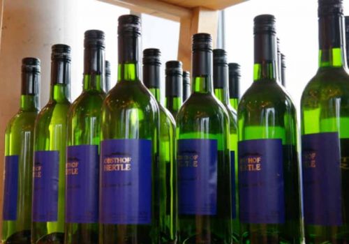 green glass wine bottles with lids and blue labels wholesale