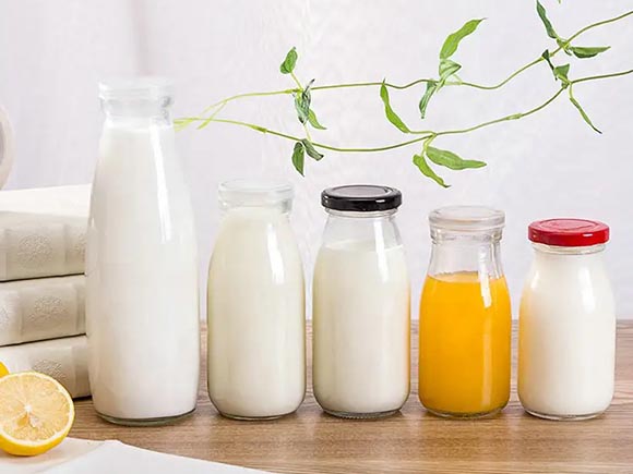 milk bottle with different lids